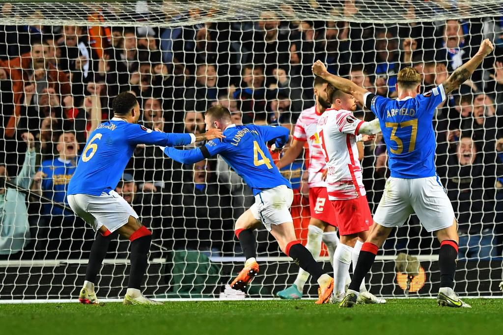 John Lundstram wheels off after scoring the decisive winner.