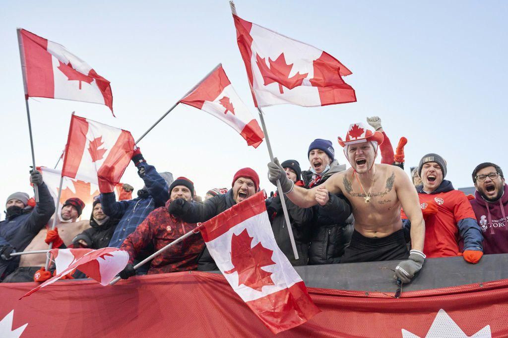 Canadian fans celebrate after the team's 2-0 win over the United States on Sunday which has left them on the brink of World Cup qualification