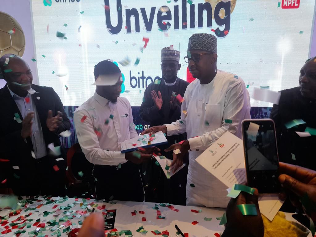 Parah and Dikko shakes hands to seal the deal.