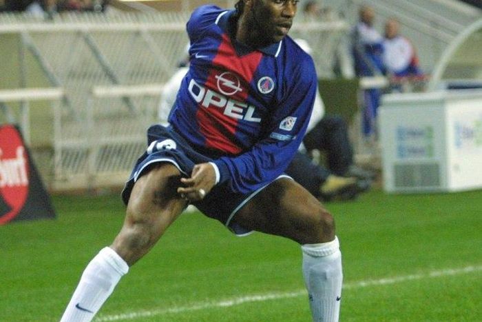 Then PSG midfielder Jay-Jay Okocha controls the ball during a French first division match at Parc des princes stadium in Paris, in 2000