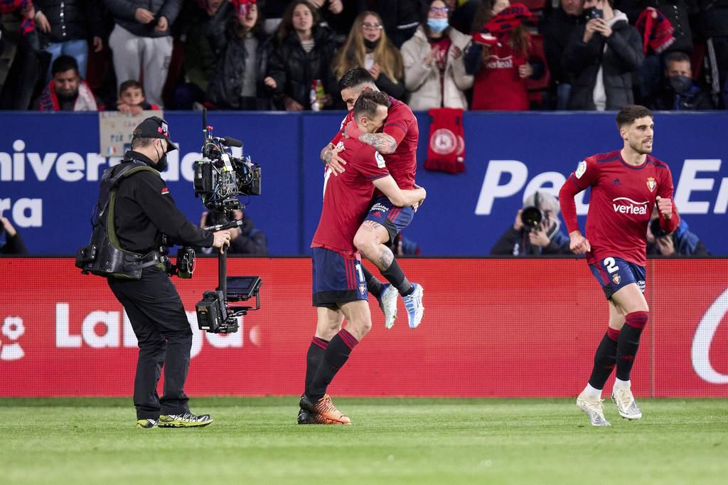 Chimmy Avila (R) celebrates with Budimir for netting the equaliser