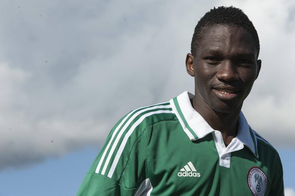 A young Kenneth Omeruo smiling as he represents his country