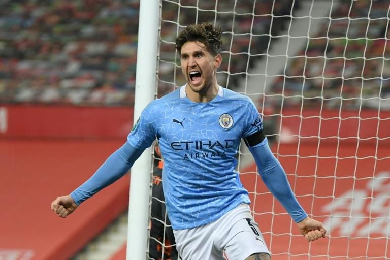 John Stones opened the scoring as Manchester City beat Manchester United to reach the League Cup final