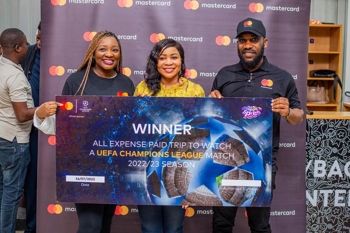 From L-R: Yosola Atere, Marketing Director, Mastercard West Africa; Kemi Lawal, winner of the Mastercard football competition; and Mastercard football ambassador, Jay-Jay Okocha, in Lagos, on Saturday, July 16 2022.