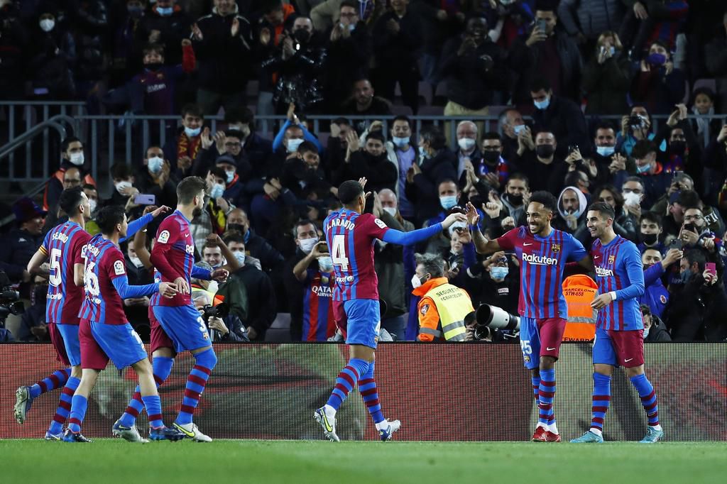 Barcelona players celebrating the opener with Pierre-Emerick Aubameyang