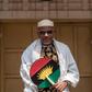 Political activist and leader of the Indigenous People of Biafra (IPOB) movement, Nnamdi Kanu (L), wearing a Jewish prayer shawl, poses in the garden of his house in Umuahia, southeast Nigeria, on May 26, 2017, before commemoration of the 50th annivers...