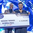 Progress Chukwuyem, winner of the Nigerian Idol Season 7, with a cheque of N30,000,000 (Thirty Million Naira) as part of the N100,000,000, worth of prizes; and Rite Foods’ Brand Manager, Boluwatife Adedugbe, at the grand finale of the music reality sho...