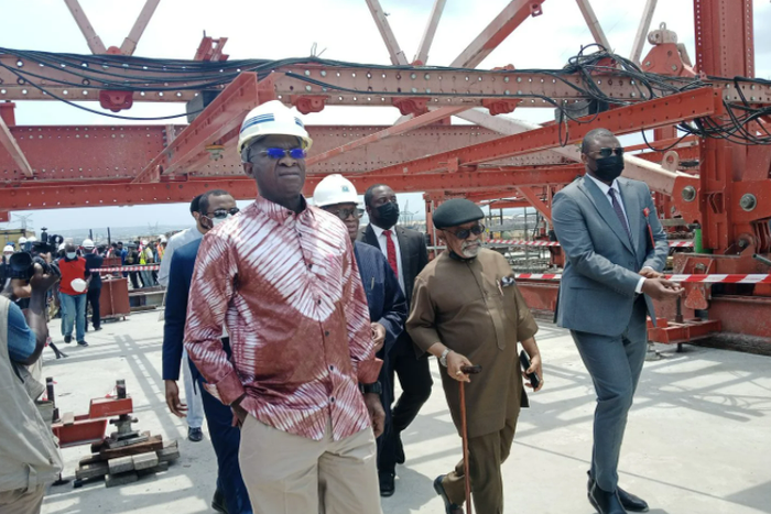 Minister of Works and Housing, Babatunde Fashola and Labour Minister, Chris Ngige inspecting the  construction of the 2nd Niger Bridge. (Daily Post)