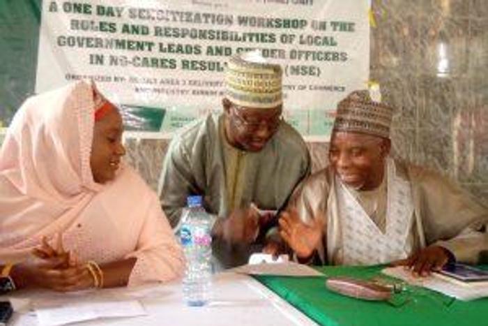 L-R: Coordinator, NG-CARES in Kebbi State, Hajiya Ruqayya Mohammed-Bawa, Special Adviser on Media to Gov. Atiku Bagudu of Kebbi State, Mallam Yahaya Sarki and Commissioner for Commerce and Industries, Alhaji Ibrahim Garba-Geza discussing during a sensi...