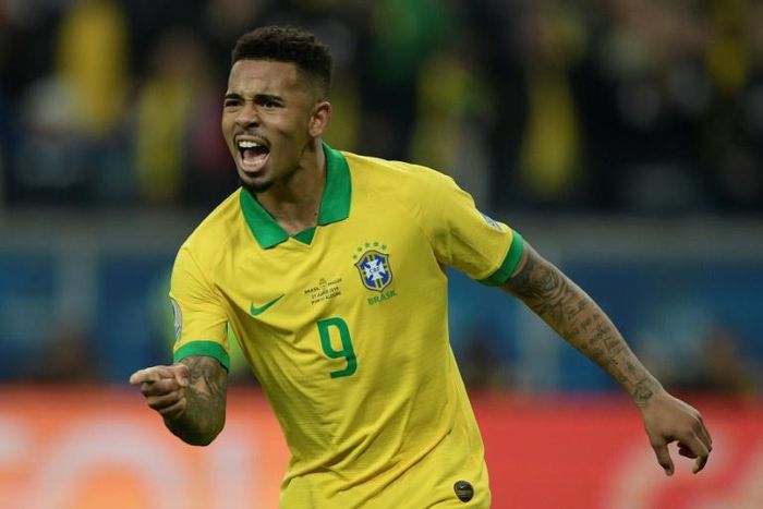 Brazil's Gabriel Jesus celebrates after scoring his penalty to defeat Paraguay in the penalty shoot-out during their Copa America quarter-final match at the Gremio Arena in Porto Alegre, Brazil