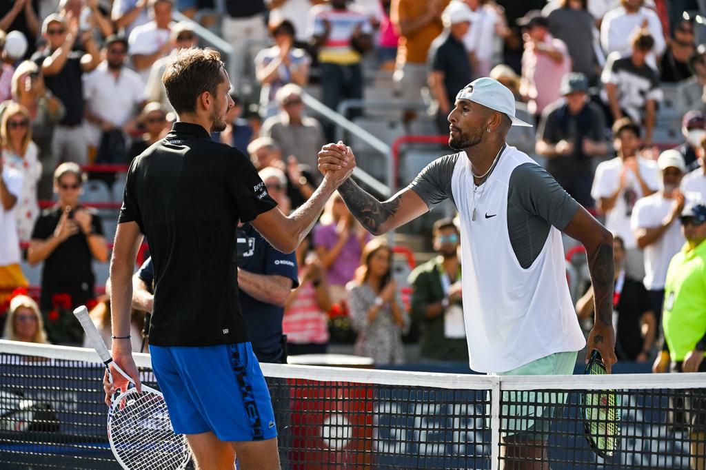 Nick Kyrgios(Right) defeated Daniil Medvedev at the National Bank Open in Montreal on Wednesday