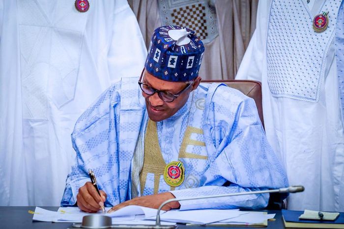 Photos of the 2020 Budget signing by President Buhari (Twitter @BashirAhmaad)
