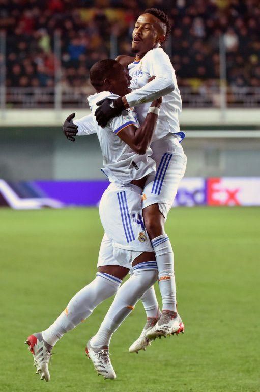 David Alaba celebrates with Eder Militao after scoring the opening goal