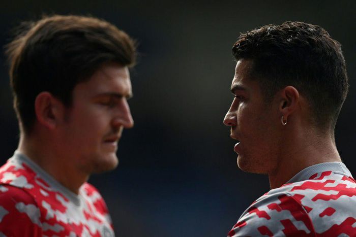 Harry Maguire (left) has denied reports of a rift with Cristiano Ronaldo at Manchester United