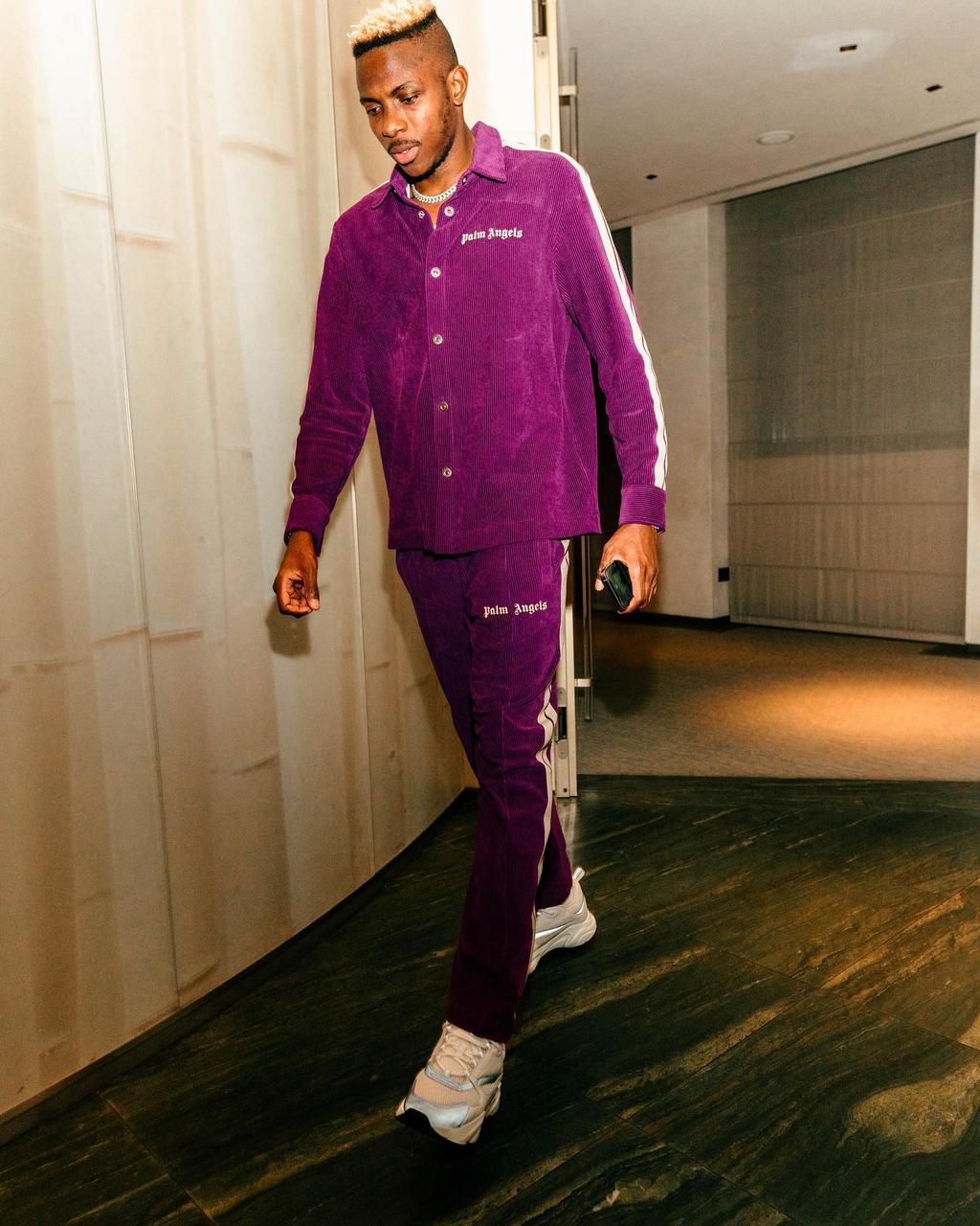 Victor Osimhen rocks purple outfit on social media