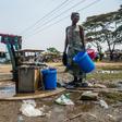 Working class residents like these in the Harare suburb of Glen View rely on water pumped from a boreholes drilled by a donor or city authorities
