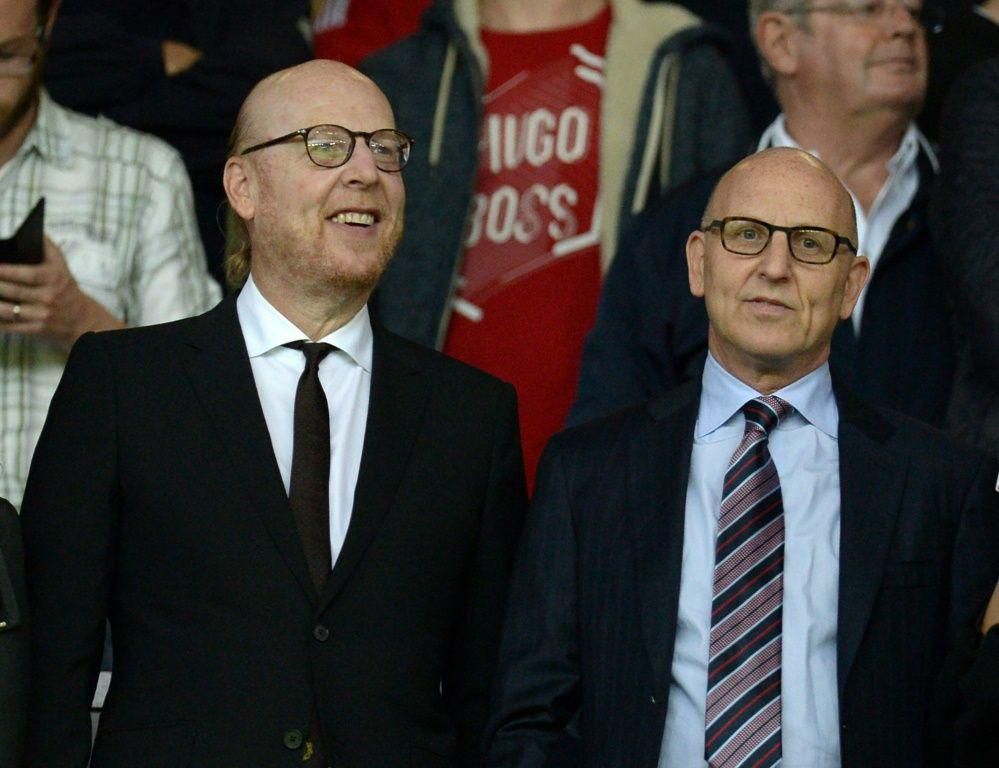 Manchester United co-chairman Joel Glazer (R) with his brother and fellow owner Avram Glazer (L)