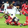 Egypt captain Mohamed Salah (C) is fouled by Guinea-Bissau defender Fali Cande during an Africa Cup of Nations Group D match in Garoua on Saturday