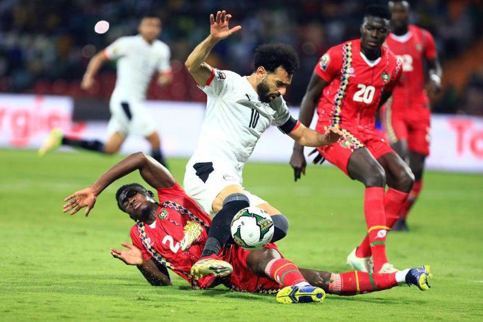 Egypt captain Mohamed Salah (C) is fouled by Guinea-Bissau defender Fali Cande during an Africa Cup of Nations Group D match in Garoua on Saturday