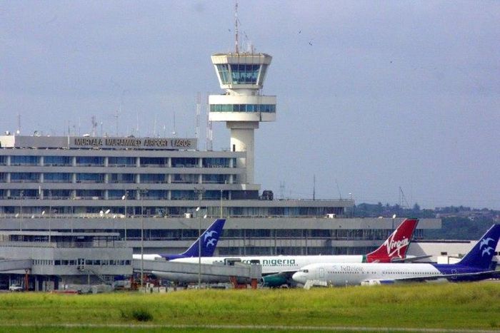 Passenger planes pictured at Murtala Mohammed International Airport in the Nigerian commercial capital Lagos on October 23, 2005