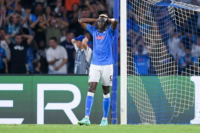 Victor Osimhen reacts after missing the penalty.