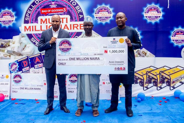 Mr Aliyu Dan Aliyu Regional Sales Director, (North-West) Dangote Cement Plc, Isiyaka Yinusa, and Mr. Rabiu Umar, Group Head, Sales & Marketing, Dangote Cement Plc,