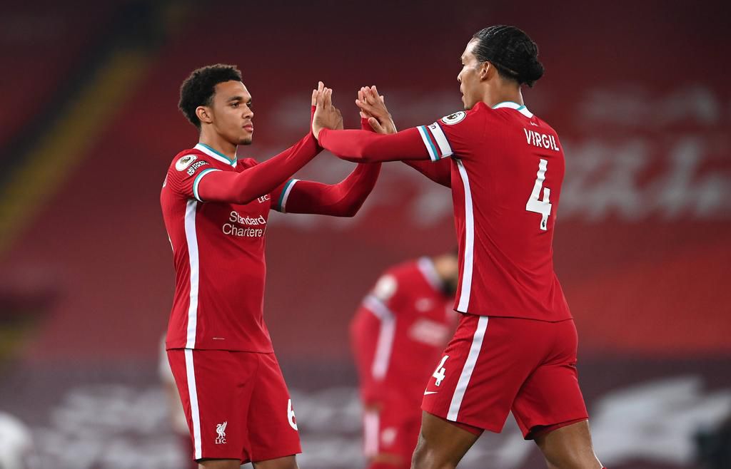 Liverpool defenders Trent Alexander-Arnold (L) and Virgil Van Dijk (R) have both been in imperious form this season
