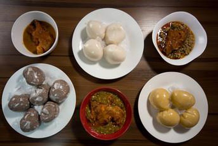 Different Nigerian meals have a discussion {Adobestock]