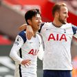 Tottenham's Son Heung-min celebrates with Harry Kane (R)