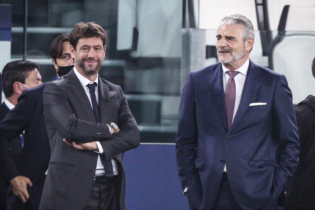 Juventus president Andrea Agnelli (L) and club director Maurizio Arrivabene are keen to see the European Super League