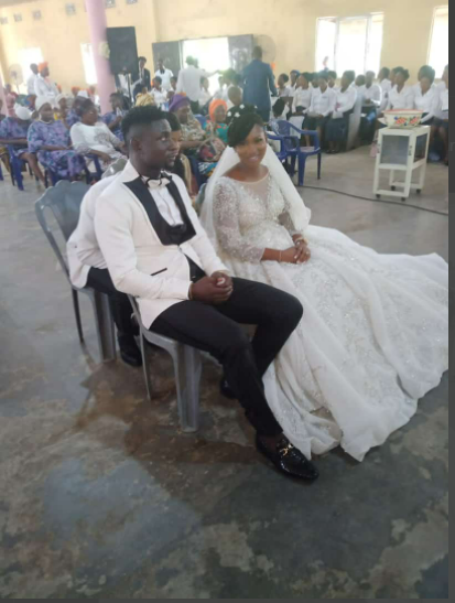 Super Eagles goalkeeper John Noble and his wife at their church wedding