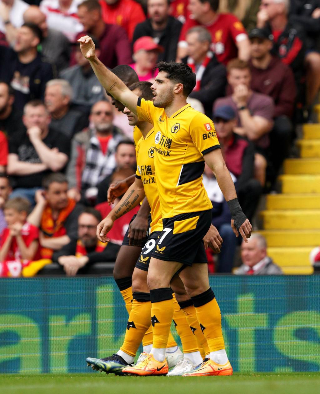 Pedro Neto celebrates his opener with his Wolves teammates
