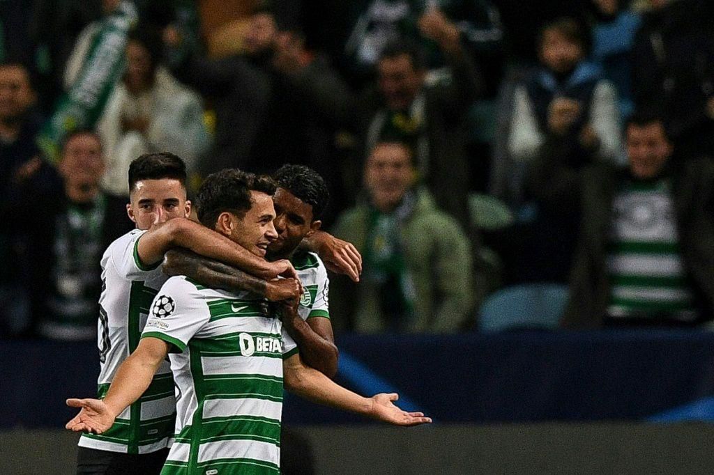Pedro Goncalves (C) celebrates his two goals for Sporting Lisbon against Dortmund