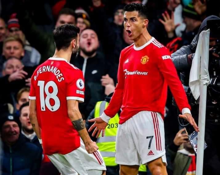 Bruno Fernandes and Cristiano Ronaldo celebrate at Old Trafford on Thursday night.