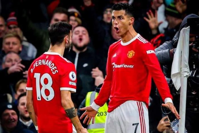 Bruno Fernandes and Cristiano Ronaldo celebrate at Old Trafford on Thursday night.