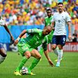 Osaze (m) in a match for Nigeria against France at the 2014 World Cup