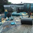 Police officers destroying illegally refined diesel in Warri [NAN]