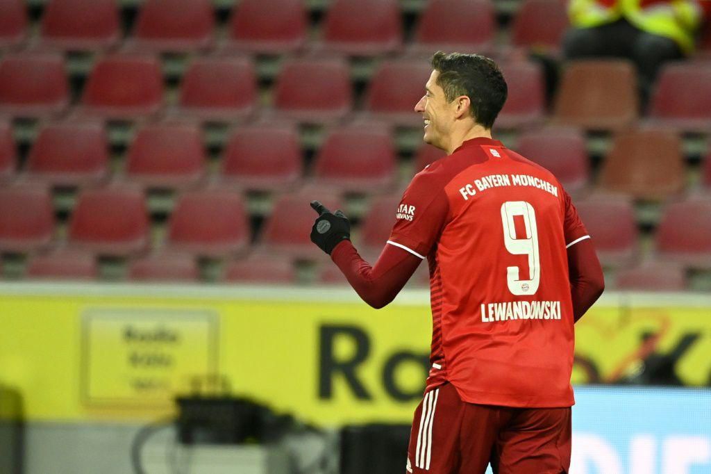 Bayern Munich striker Robert Lewandowski celebrates scoring his 300th Bundesliga goal on Saturday