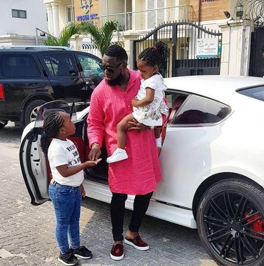 Timaya with his daughters, Grace and Emma