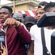 Mr Macaroni and protesting youths in Lagos (Newsguru)