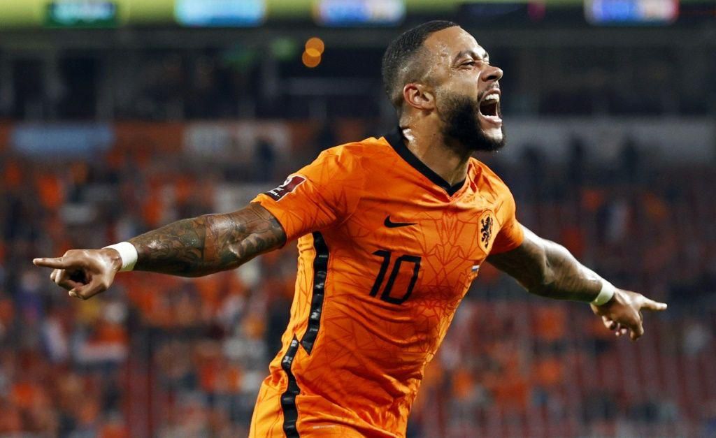 Memphis Depay celebrates after scoring against Turkey