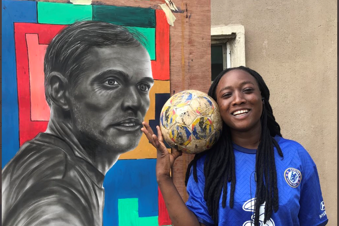 Female football painter