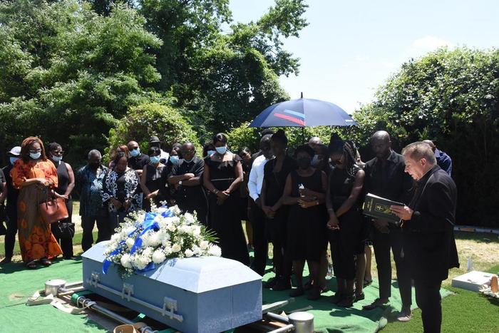 Rev. Fr. Robert Grippo, Parish Priest of Our Lady of Fatima and Annunciation, Westchester praying over the remains of a retired diplomat, Amb. Eloho Otobo, at Gate of Heaven, Cemetery in New York, U.S. on Friday, July 22, 2022