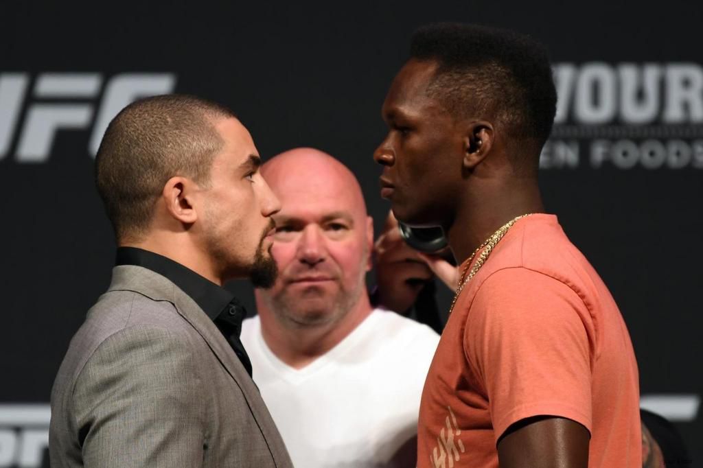 Whittaker(Left) vs Adesanya will rematch on February 12