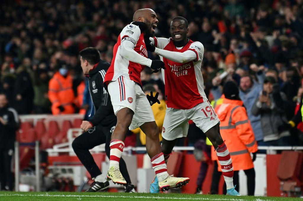Arsenal's Alexandre Lacazette (L) celebrates with Nicolas Pepe