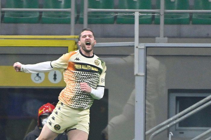 French forward Thomas Henry stunned the San Siro with his early header