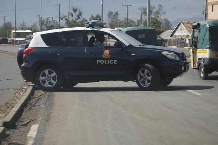 A file photo of a police car on the road