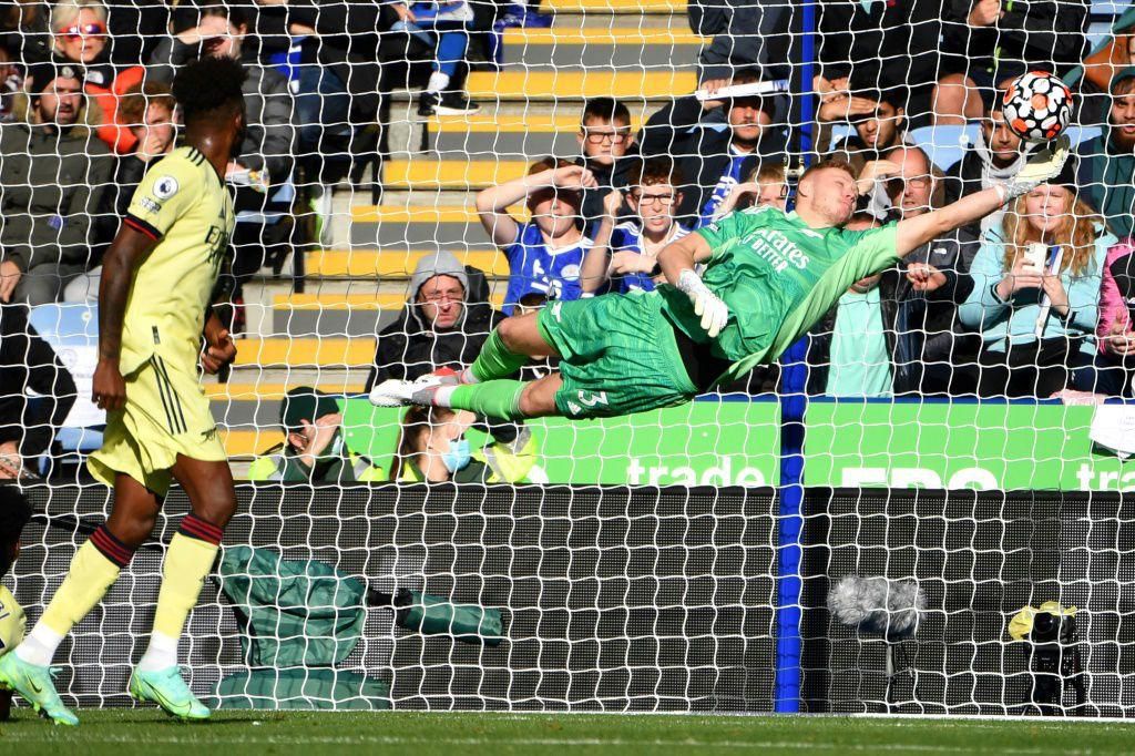 Arsenal goalkeeper Aaron Ramsdale saves a free-kick taken by Leicester midfielder James Maddison