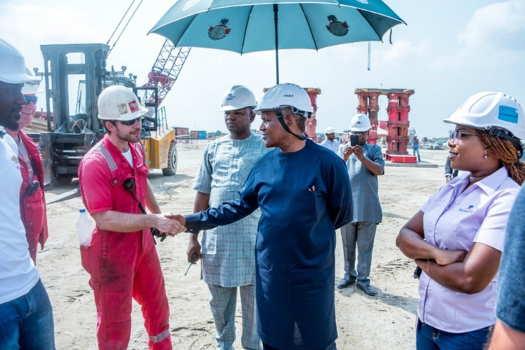 Aliko Dangote and other officials at Dangote Refinery site