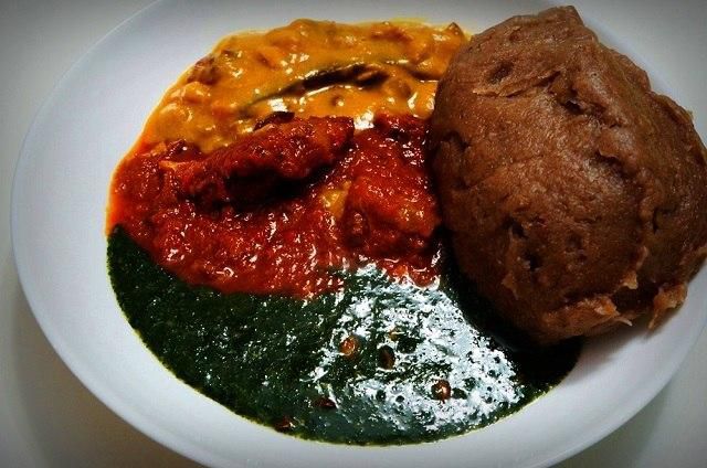 A plate of amala and ewedu soup